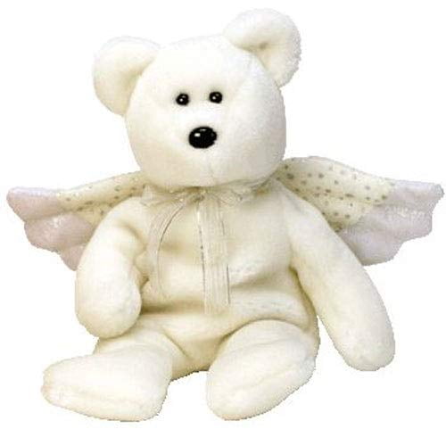 Cute angel plays with hot toys and bear